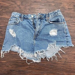 Distressed denim shorts